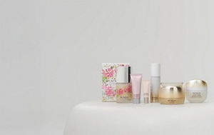 Mother's Day gifts shown next to each other on a white table with light neutral background